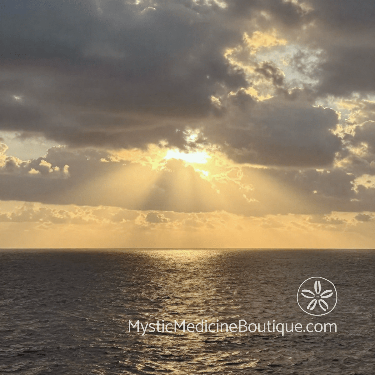 Dramatic golden sunset over dark ocean — powerful imagery for solar plexus chakra healing during spiritual emergency and reclaiming personal power